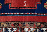 Vintage caucasian rug in a living room setting, pile rug, Turkish rug, vintage rug, portland, rug shop, bright colors, wild shaman, soft rug, bold color, Portland, Oregon, rug store, rug shop, local shop, antique rug