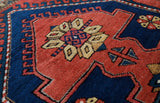Vintage caucasian rug in a living room setting, pile rug, Turkish rug, vintage rug, portland, rug shop, bright colors, wild shaman, soft rug, bold color, Portland, Oregon, rug store, rug shop, local shop, antique rug