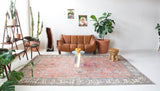 Vintage Turkish rug in living room setting, old rug, antique rug, pastel colors, faded colors, Turkish rug, vintage rug, soft rug, Portland, Oregon, rug store, rug shop, local shop
