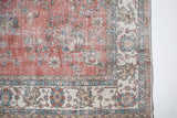 Vintage Turkish rug in living room setting, old rug, antique rug, pastel colors, faded colors, Turkish rug, vintage rug, soft rug, Portland, Oregon, rug store, rug shop, local shop