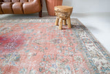 Vintage Turkish rug in living room setting, old rug, antique rug, pastel colors, faded colors, Turkish rug, vintage rug, soft rug, Portland, Oregon, rug store, rug shop, local shop