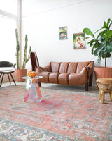 Vintage Turkish rug in living room setting, old rug, antique rug, pastel colors, faded colors, Turkish rug, vintage rug, soft rug, Portland, Oregon, rug store, rug shop, local shop