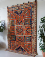 Vintage Turkish rug in living room setting, old rug, antique rug, pastel colors, faded colors, Turkish rug, vintage rug, soft rug, Portland, Oregon, rug store, rug shop, local shop