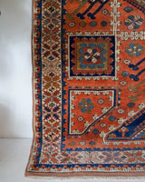 Vintage Turkish rug in living room setting, old rug, antique rug, pastel colors, faded colors, Turkish rug, vintage rug, soft rug, Portland, Oregon, rug store, rug shop, local shop