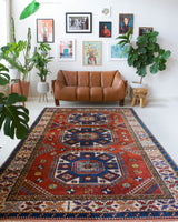 Vintage Turkish rug in a living room setting, pile rug, Turkish rug, vintage rug, portland, rug shop, bright colors, wild shaman, soft rug, bold color, Portland, Oregon, rug store, rug shop, local shop, antique rug