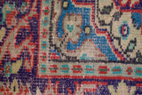 Vintage Turkish  rug in a living room setting, pile rug, Turkish rug, vintage rug, portland, rug shop, bright colors, wild shaman, soft rug, bold color, Portland, Oregon, rug store, rug shop, local shop, antique rug, distressed rug, worn out rug