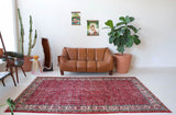 Vintage Turkish  rug in a living room setting, pile rug, Turkish rug, vintage rug, portland, rug shop, bright colors, wild shaman, soft rug, bold color, Portland, Oregon, rug store, rug shop, local shop, antique rug, distressed rug, worn out rug
