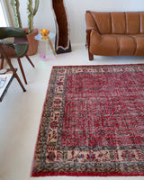 Vintage Turkish  rug in a living room setting, pile rug, Turkish rug, vintage rug, portland, rug shop, bright colors, wild shaman, soft rug, bold color, Portland, Oregon, rug store, rug shop, local shop, antique rug, distressed rug, worn out rug