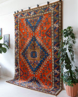 Vintage Turkish rug in a living room setting, pile rug, Turkish rug, vintage rug, portland, rug shop, bright colors, wild shaman, soft rug, bold color, Portland, Oregon, rug store, rug shop, local shop, antique rug