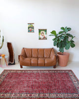 Vintage Turkish  rug in a living room setting, pile rug, Turkish rug, vintage rug, portland, rug shop, bright colors, wild shaman, soft rug, bold color, Portland, Oregon, rug store, rug shop, local shop, antique rug, distressed rug, worn out rug