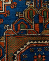 Vintage Turkish rug in a living room setting, pile rug, Turkish rug, vintage rug, portland, rug shop, bright colors, wild shaman, soft rug, bold color, Portland, Oregon, rug store, rug shop, local shop, antique rug