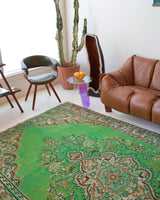 Vintage Turkish  rug in a living room setting, pile rug, Turkish rug, vintage rug, portland, rug shop, bright colors, wild shaman, soft rug, bold color, Portland, Oregon, rug store, rug shop, local shop, antique rug, distressed rug, worn out rug