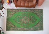 Vintage Turkish  rug in a living room setting, pile rug, Turkish rug, vintage rug, portland, rug shop, bright colors, wild shaman, soft rug, bold color, Portland, Oregon, rug store, rug shop, local shop, antique rug, distressed rug, worn out rug