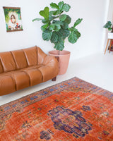 Vintage Turkish  rug in a living room setting, pile rug, Turkish rug, vintage rug, portland, rug shop, bright colors, wild shaman, soft rug, bold color, Portland, Oregon, rug store, rug shop, local shop, antique rug, distressed rug, worn out rug