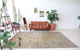 Vintage Turkish rug in living room setting, old rug, antique rug, pastel colors, faded colors, Turkish rug, vintage rug, soft rug, Portland, Oregon, rug store, rug shop, local shop