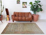 Vintage Turkish rug in living room setting, old rug, antique rug, pastel colors, faded colors, Turkish rug, vintage rug, soft rug, Portland, Oregon, rug store, rug shop, local shop