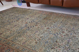 Vintage Turkish rug in living room setting, old rug, antique rug, pastel colors, faded colors, Turkish rug, vintage rug, soft rug, Portland, Oregon, rug store, rug shop, local shop
