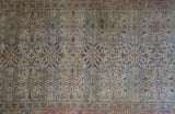 Vintage Turkish rug in living room setting, old rug, antique rug, pastel colors, faded colors, Turkish rug, vintage rug, soft rug, Portland, Oregon, rug store, rug shop, local shop