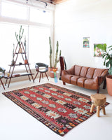 Vintage kilim rug in room decor setting, kilim, Turkish rug, vintage rug, portland, rug shop, bright colors, wild shaman, soft rug, bold color, Portland, Oregon, rug store, rug shop, local shop, antique rug