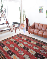 Vintage kilim rug in room decor setting, kilim, Turkish rug, vintage rug, portland, rug shop, bright colors, wild shaman, soft rug, bold color, Portland, Oregon, rug store, rug shop, local shop, antique rug