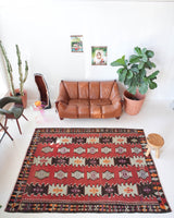 Vintage kilim rug in room decor setting, kilim, Turkish rug, vintage rug, portland, rug shop, bright colors, wild shaman, soft rug, bold color, Portland, Oregon, rug store, rug shop, local shop, antique rug