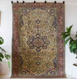 Area rug in a living room setting, pile rug, Turkish rug, old rug, antique rug, pastel colors, faded colors, Turkish rug, vintage rug, soft rug, Portland, Oregon, rug store, rug shop, local shop