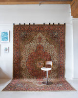 Area rug in a living room setting, pile rug, Turkish rug, old rug, antique rug, pastel colors, faded colors, Turkish rug, vintage rug, soft rug, Portland, Oregon, rug store, rug shop, local shop