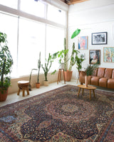 Vintage Turkish rug in a living room setting, pile rug, Turkish rug, vintage rug, portland, rug shop, bright colors, wild shaman, soft rug, bold color, Portland, Oregon, rug store, rug shop, local shop