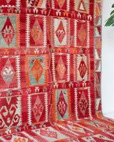Vintage kilim rug in room decor setting, kilim, Turkish rug, vintage rug, portland, rug shop, bright colors, wild shaman, soft rug, bold color, Portland, Oregon, rug store, rug shop, local shop, antique rug