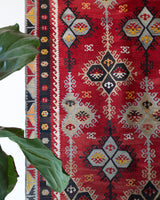 Vintage kilim rug in room decor setting, kilim, Turkish rug, vintage rug, portland, rug shop, bright colors, wild shaman, soft rug, bold color, Portland, Oregon, rug store, rug shop, local shop, antique rug