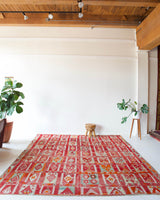 Vintage kilim rug in room decor setting, kilim, Turkish rug, vintage rug, portland, rug shop, bright colors, wild shaman, soft rug, bold color, Portland, Oregon, rug store, rug shop, local shop, antique rug