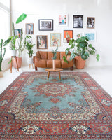 Area rug in a living room setting, pile rug, Turkish rug, old rug, antique rug, pastel colors, faded colors, Turkish rug, vintage rug, soft rug, Portland, Oregon, rug store, rug shop, local shop