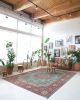 Area rug in a living room setting, pile rug, Turkish rug, old rug, antique rug, pastel colors, faded colors, Turkish rug, vintage rug, soft rug, Portland, Oregon, rug store, rug shop, local shop