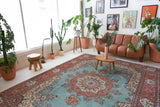 Area rug in a living room setting, pile rug, Turkish rug, old rug, antique rug, pastel colors, faded colors, Turkish rug, vintage rug, soft rug, Portland, Oregon, rug store, rug shop, local shop