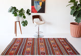 Vintage kilim rug in room decor setting, kilim, Turkish rug, vintage rug, portland, rug shop, bright colors, wild shaman, soft rug, bold color, Portland, Oregon, rug store, rug shop, local shop, antique rug
