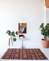 Vintage kilim rug in room decor setting, kilim, Turkish rug, vintage rug, portland, rug shop, bright colors, wild shaman, soft rug, bold color, Portland, Oregon, rug store, rug shop, local shop, antique rug