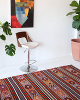 Vintage kilim rug in room decor setting, kilim, Turkish rug, vintage rug, portland, rug shop, bright colors, wild shaman, soft rug, bold color, Portland, Oregon, rug store, rug shop, local shop, antique rug