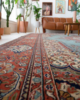 Area rug in a living room setting, pile rug, Turkish rug, old rug, antique rug, pastel colors, faded colors, Turkish rug, vintage rug, soft rug, Portland, Oregon, rug store, rug shop, local shop