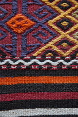 Vintage kilim rug in room decor setting, kilim, Turkish rug, vintage rug, portland, rug shop, bright colors, wild shaman, soft rug, bold color, Portland, Oregon, rug store, rug shop, local shop, antique rug