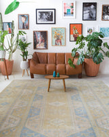 Vintage Turkish rug in living room setting, old rug, antique rug, pastel colors, faded colors, Turkish rug, vintage rug, soft rug, Portland, Oregon, rug store, rug shop, local shop