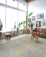 Vintage Turkish rug in living room setting, old rug, antique rug, pastel colors, faded colors, Turkish rug, vintage rug, soft rug, Portland, Oregon, rug store, rug shop, local shop