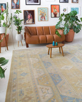 Vintage Turkish rug in living room setting, old rug, antique rug, pastel colors, faded colors, Turkish rug, vintage rug, soft rug, Portland, Oregon, rug store, rug shop, local shop
