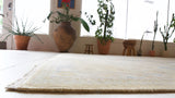 Vintage Turkish rug in living room setting, old rug, antique rug, pastel colors, faded colors, Turkish rug, vintage rug, soft rug, Portland, Oregon, rug store, rug shop, local shop