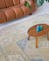 Vintage Turkish rug in living room setting, old rug, antique rug, pastel colors, faded colors, Turkish rug, vintage rug, soft rug, Portland, Oregon, rug store, rug shop, local shop