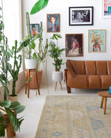 Vintage Turkish rug in living room setting, old rug, antique rug, pastel colors, faded colors, Turkish rug, vintage rug, soft rug, Portland, Oregon, rug store, rug shop, local shop