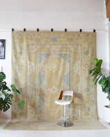 Vintage Turkish rug in living room setting, old rug, antique rug, pastel colors, faded colors, Turkish rug, vintage rug, soft rug, Portland, Oregon, rug store, rug shop, local shop