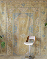 Vintage Turkish rug in living room setting, old rug, antique rug, pastel colors, faded colors, Turkish rug, vintage rug, soft rug, Portland, Oregon, rug store, rug shop, local shop