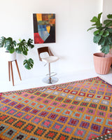 Vintage kilim rug in room decor setting, kilim, Turkish rug, vintage rug, portland, rug shop, bright colors, wild shaman, soft rug, bold color, Portland, Oregon, rug store, rug shop, local shop, antique rug