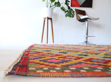 Vintage kilim rug in room decor setting, kilim, Turkish rug, vintage rug, portland, rug shop, bright colors, wild shaman, soft rug, bold color, Portland, Oregon, rug store, rug shop, local shop, antique rug