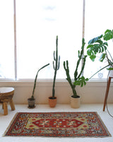 Vintage mini kilim rug in room decor setting, kilim, Turkish rug, vintage rug, portland, rug shop, bright colors, wild shaman, soft rug, bold color, Portland, Oregon, rug store, rug shop, local shop